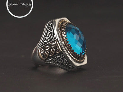 Facet-cut blue zircon ring in 925 sterling silver