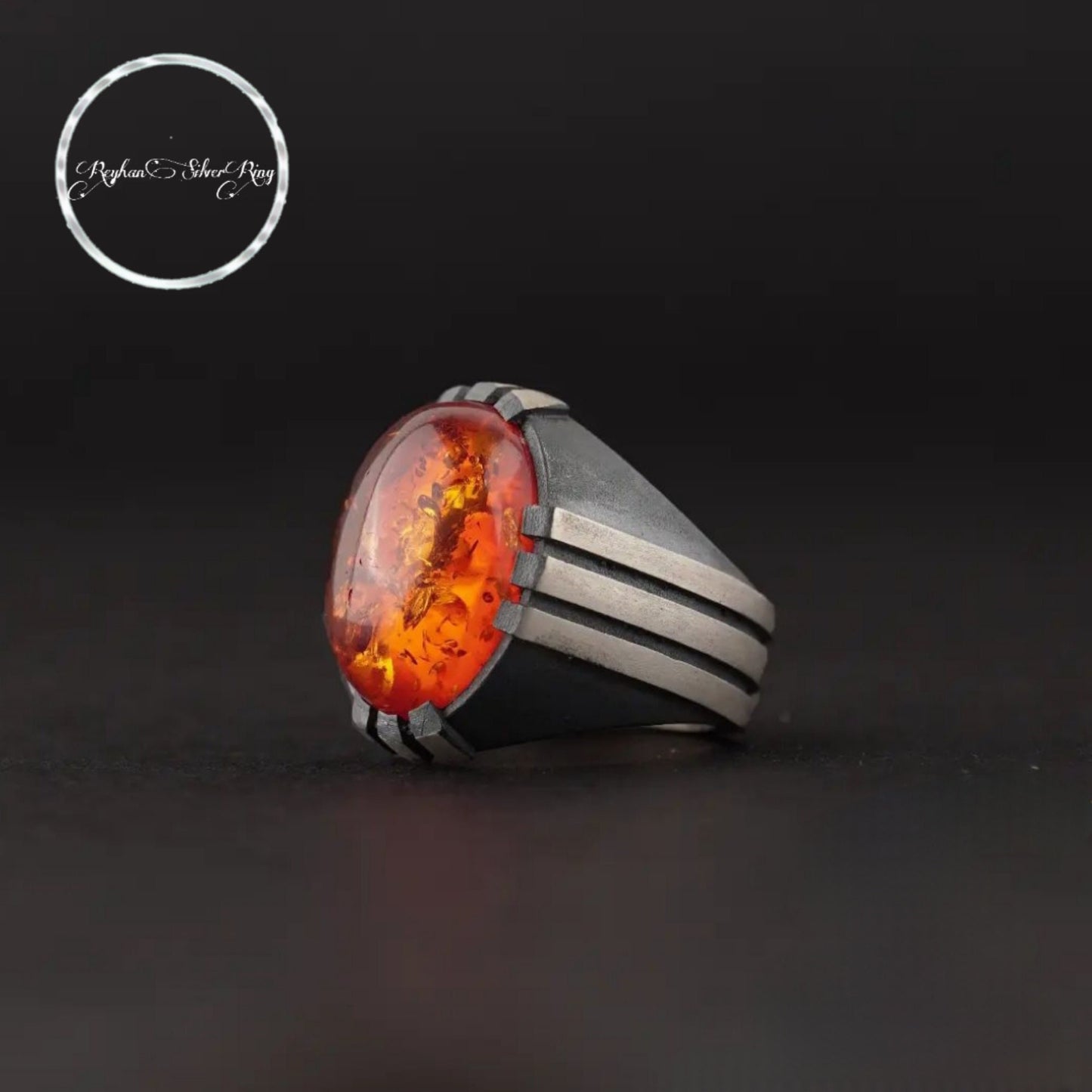 Herrenring aus Sterlingsilber mit feuerrotem Bernstein: Osmanisches Krallenmuster