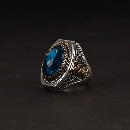 Facet-cut blue zircon ring – view 3