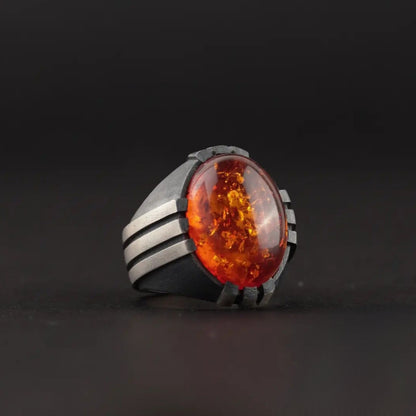 Herrenring aus Sterlingsilber mit feuerrotem Bernstein: Osmanisches Krallenmuster