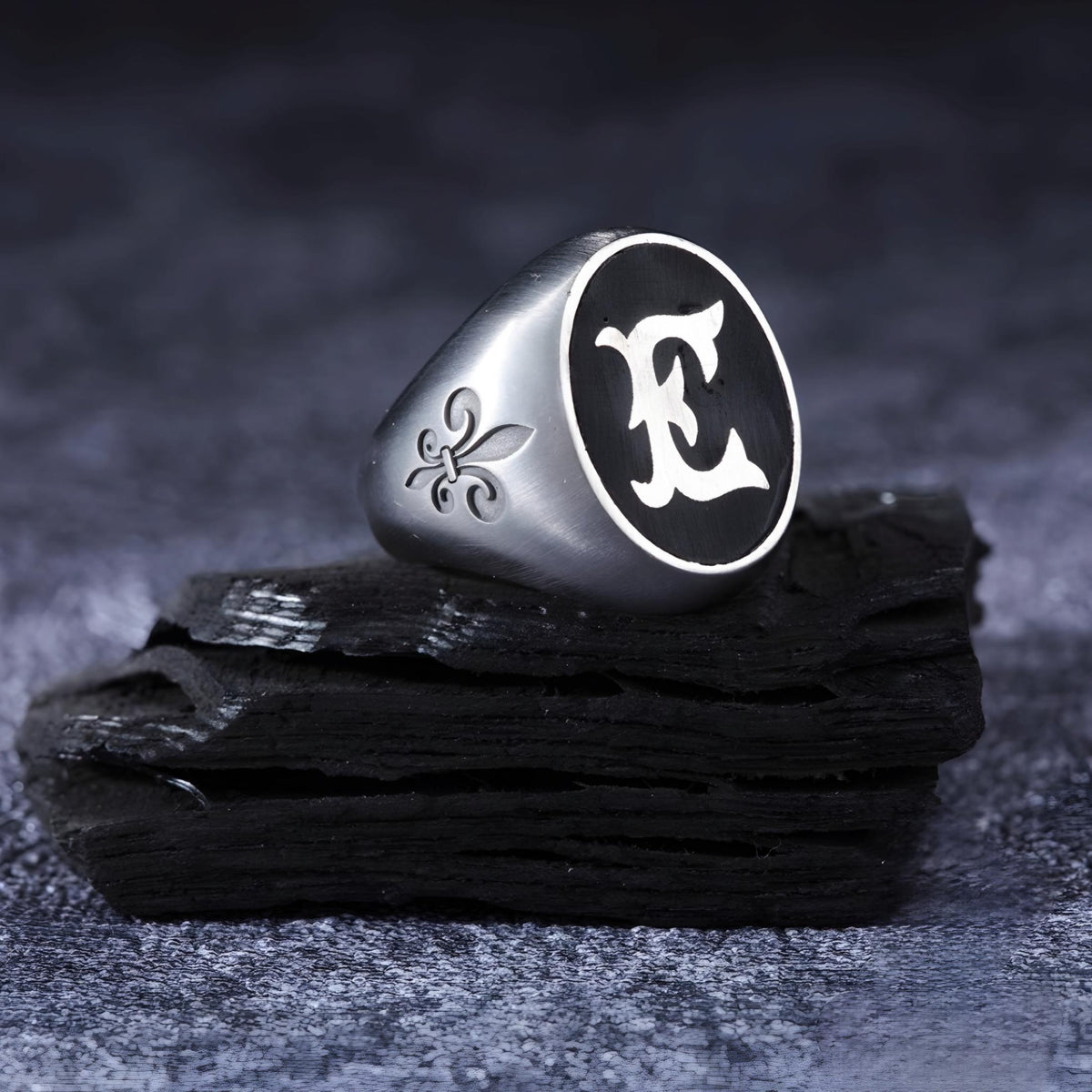 Engraved initial men's ring on black in 925 sterling silver