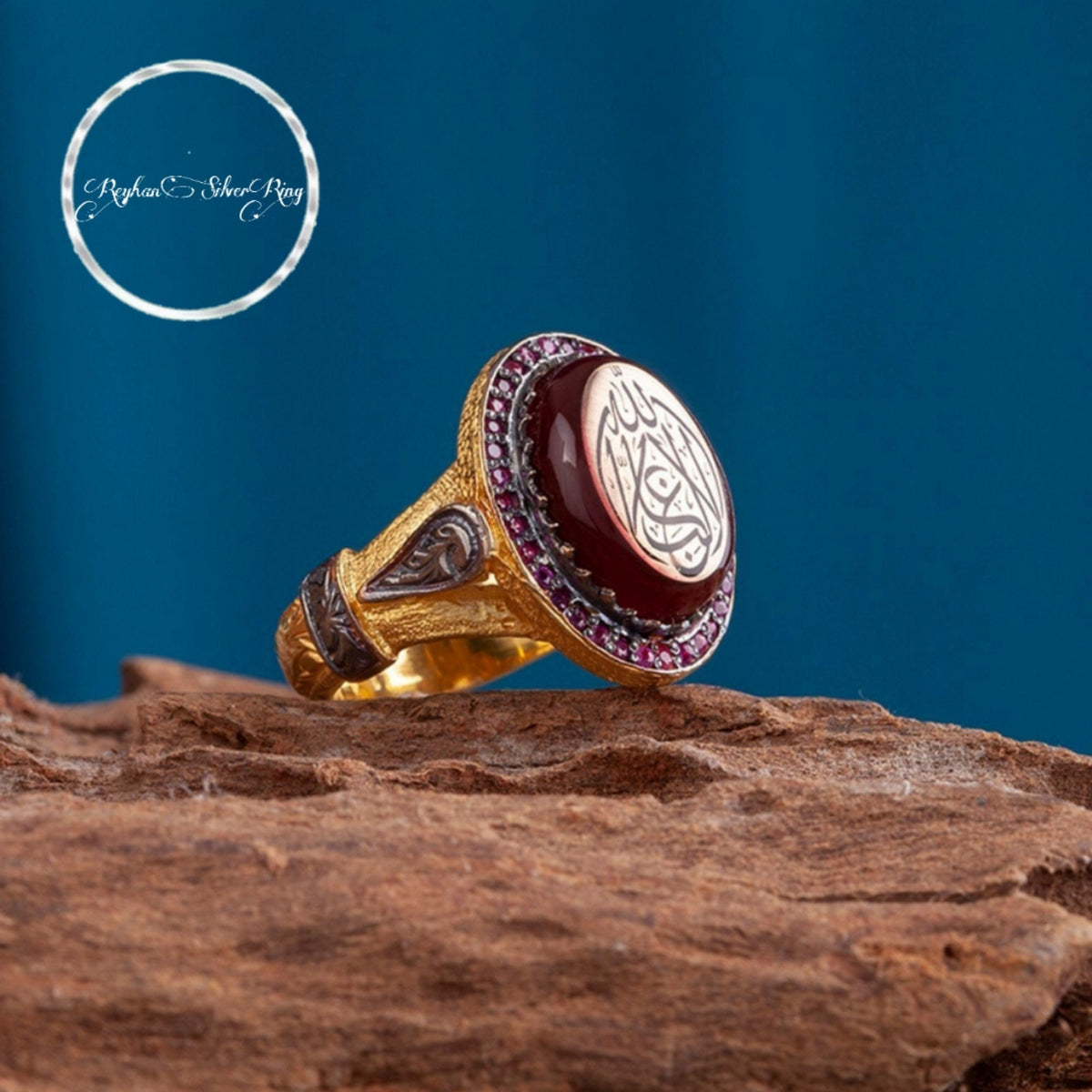 La Ghalibe Illallah Sultan Ring, Red Amber & Gilded Details in 925 sterling silver