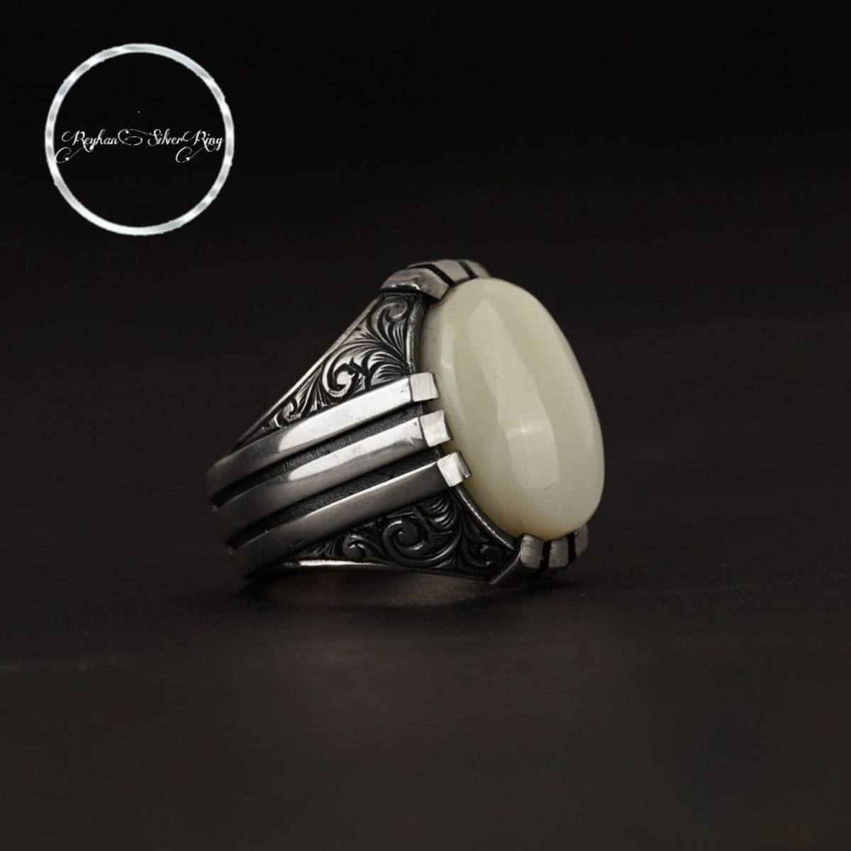 Mother of pearl oval men's ring with engraved sides in 925 sterling silver